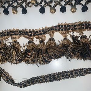 Home decor trim , black and gold , fringe , poms and braids . Costume use too